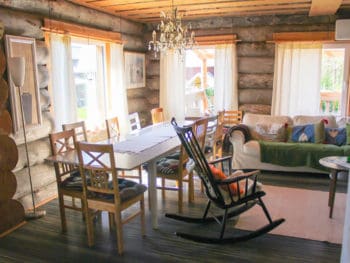 Rocking Chair and Tree Trunks Wall
