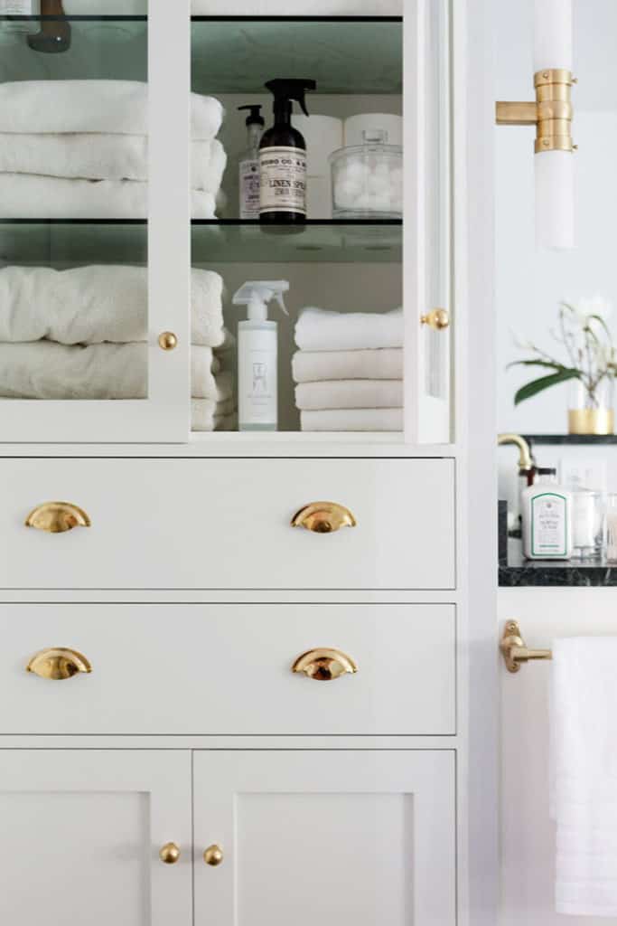 Front Closet With Gold Accents