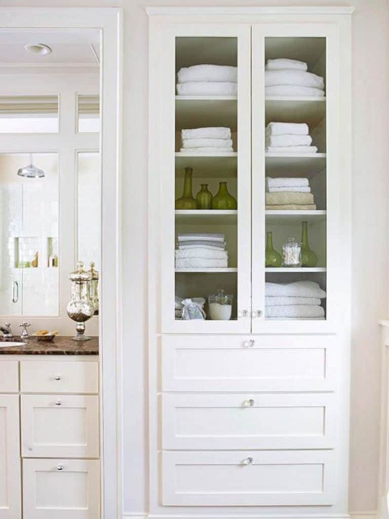 Recessed Bathroom Closet With Glass Front Doors