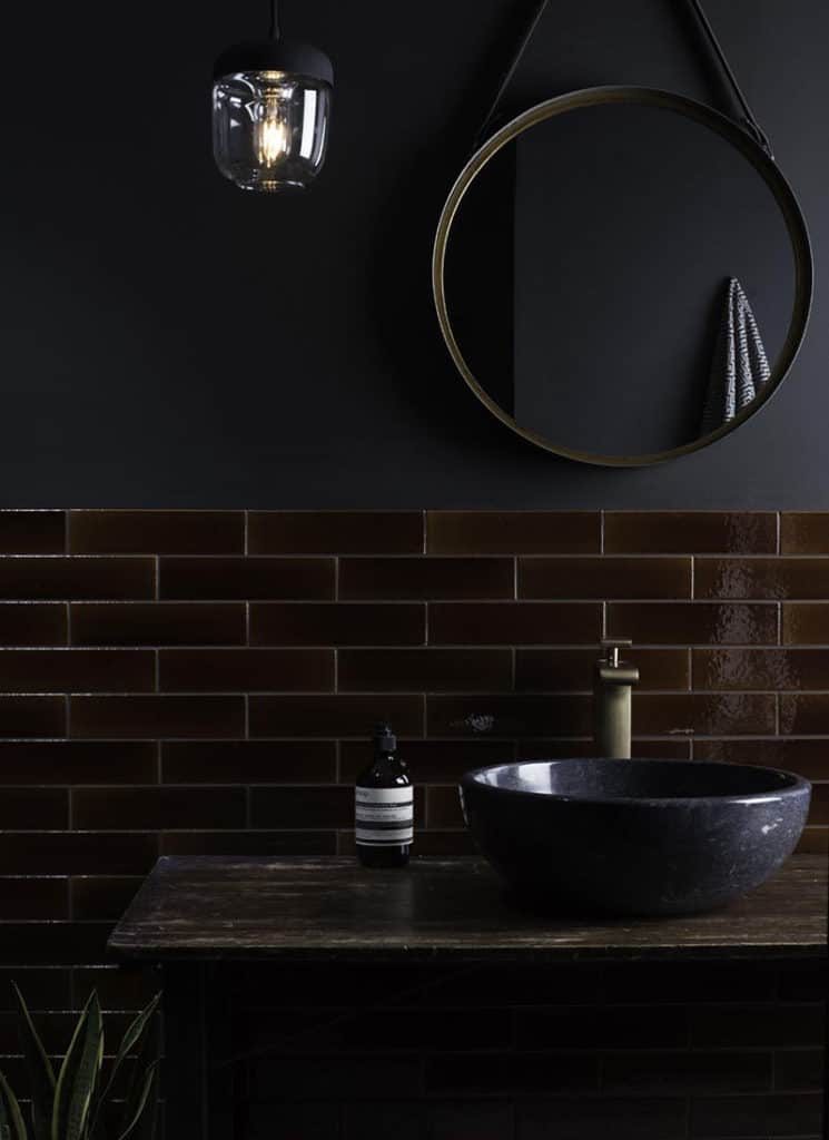 Dark Bathroom With Brown Tiles