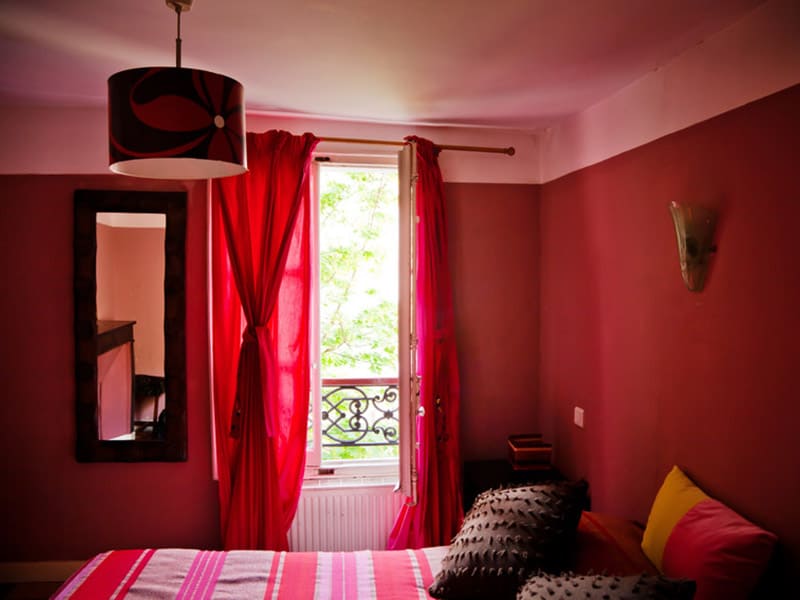 Mirror On Red Wall