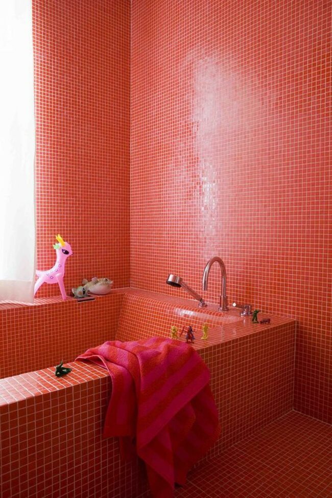 Dramatic Red Tile Bath
