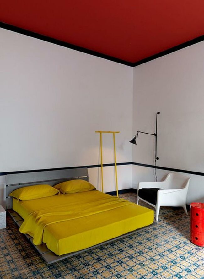 Yellow Bedding Red Ceiling
