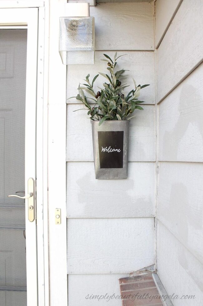 Recycled Metal Welcome Sconce